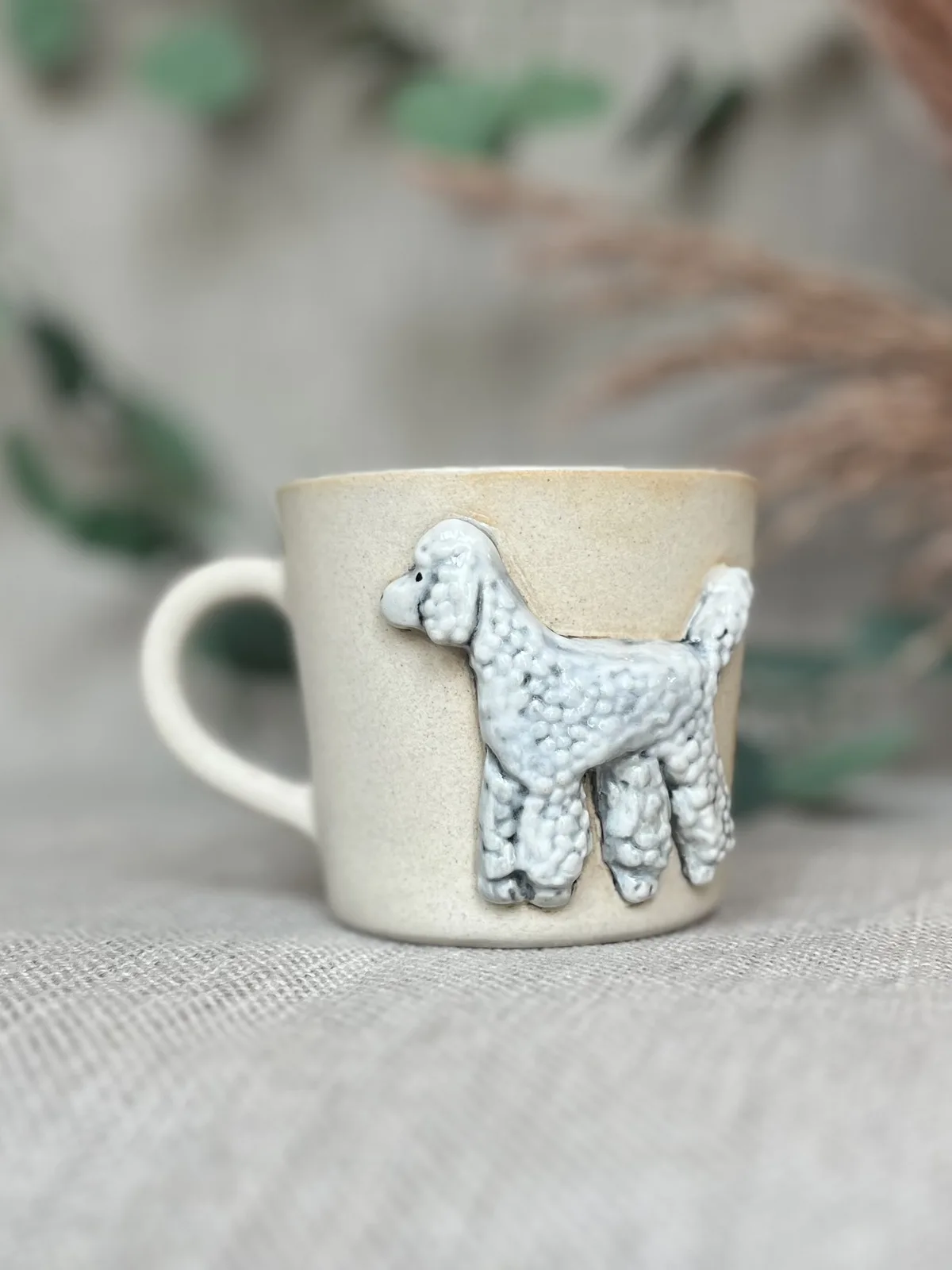 Ręcznie robiony ceramiczny kubek z uchem i pieskiem Ceranika