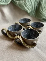 Ręcznie robiony ceramiczny kubek Ceranika z uchem zakręcona macka ośmiornicy